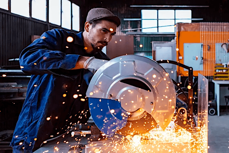 Cutting a metal slab with a chop saw