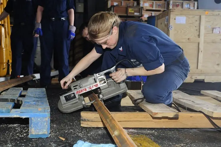 working with portable band saw